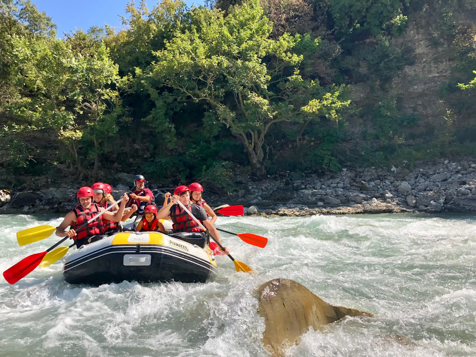 Vjosa river canyon rafting tour with turquoise water and limestone cliffs in Albania near Përmet