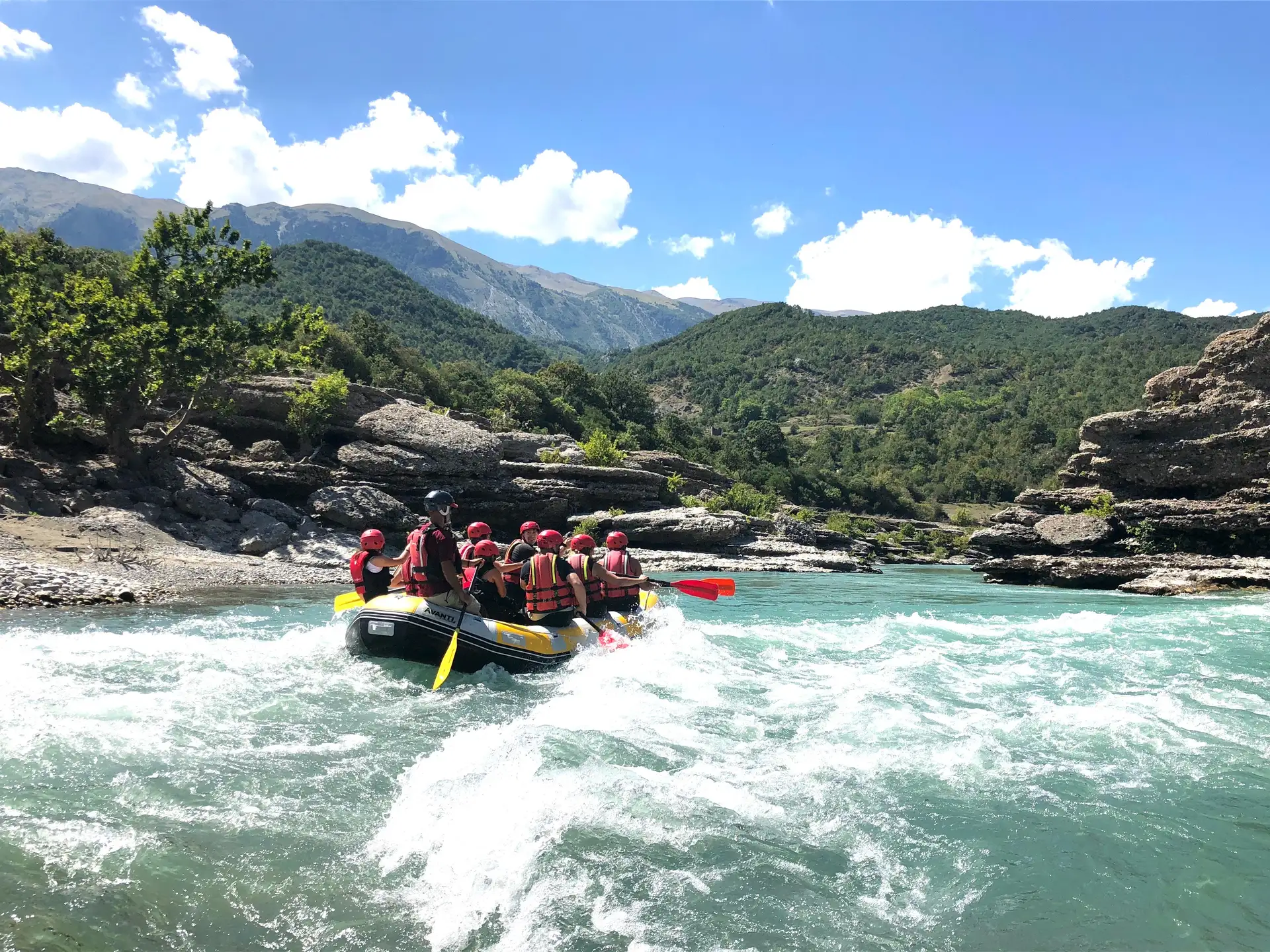 Vjosa river canyon rafting tour with turquoise water and limestone cliffs in Albania near Përmet